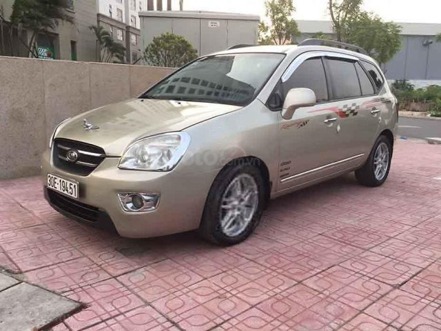 Cần bán gấp Kia Carens 2.0 AT đời 2010, màu ghi vàng