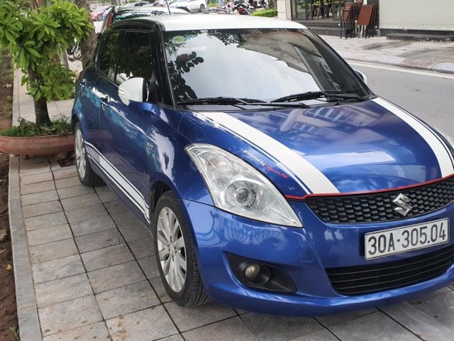 Cần bán gấp Suzuki Swift năm sản xuất 2014, màu xanh lam còn mới, giá thương lượng0