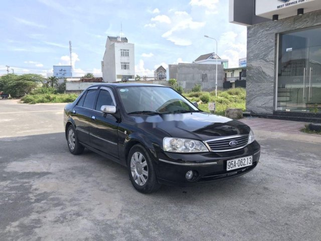 Cần bán xe Ford Laser 2004, màu đen, số tự động