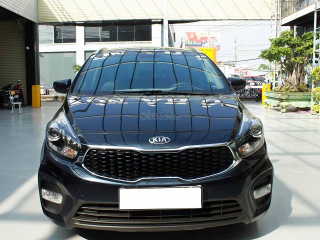 Bán xe Kia Rondo số sàn, màu xanh dương, một chủ cực đẹp mới như xe hãng0