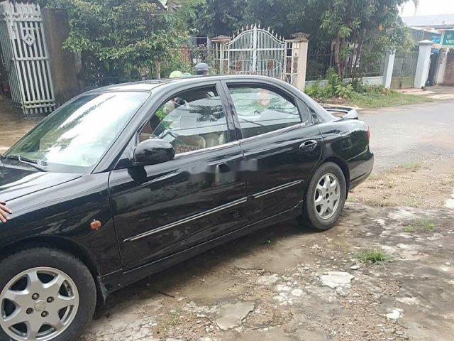 Gia đình cần bán xe Hyundai Sonata 1998, màu đen, giá chỉ 95 triệu0