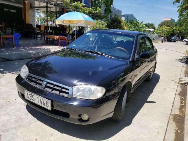 Cần bán lại xe Kia Spectra đời 2005, màu đen, xe nhập chính chủ, giá tốt0