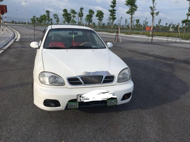 Cần bán lại xe Daewoo Lanos năm sản xuất 2004, màu trắng xe gia đình, 73tr0