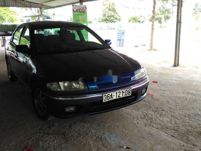 Bán xe Mazda 323 2000, màu xanh lam, nhập khẩu, còn tương đối đẹp