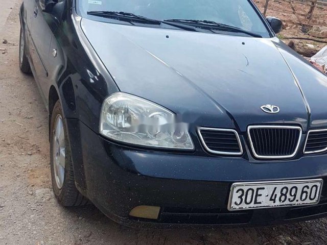 Cần bán lại xe Daewoo Lacetti đời 2004, màu đen, giá chỉ 95 triệu0