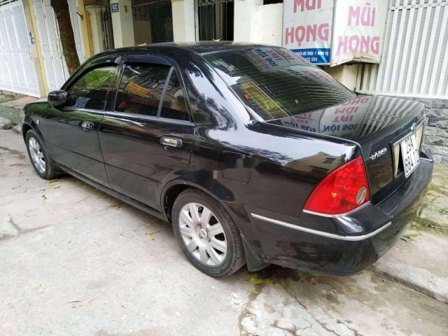 Bán xe Ford Laser sản xuất 2004, màu đen, xe nhập 0