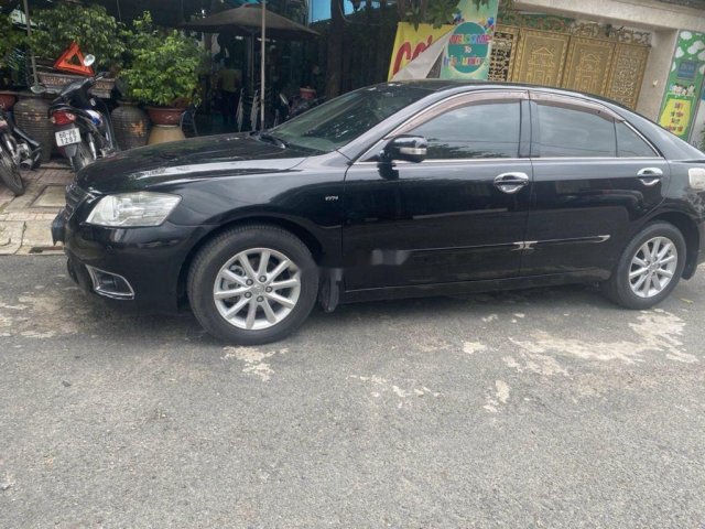 Bán Toyota Camry đời 2011, màu đen số tự động0