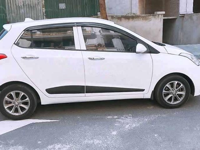 Bán Hyundai Grand i10 đời 2015, màu trắng, nhập khẩu chính chủ0