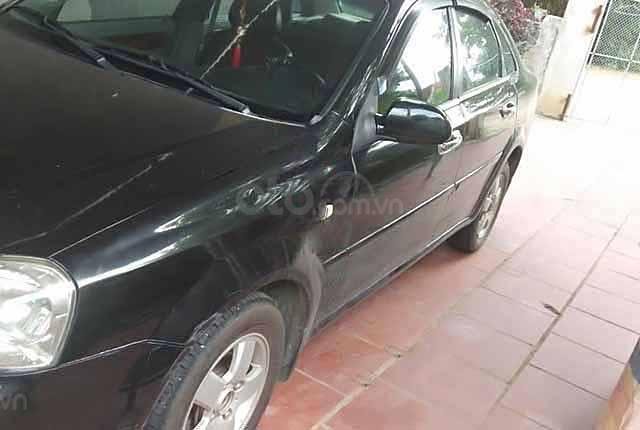 Cần bán lại xe Daewoo Lacetti EX 1.6 MT 2007, màu đen xe gia đình