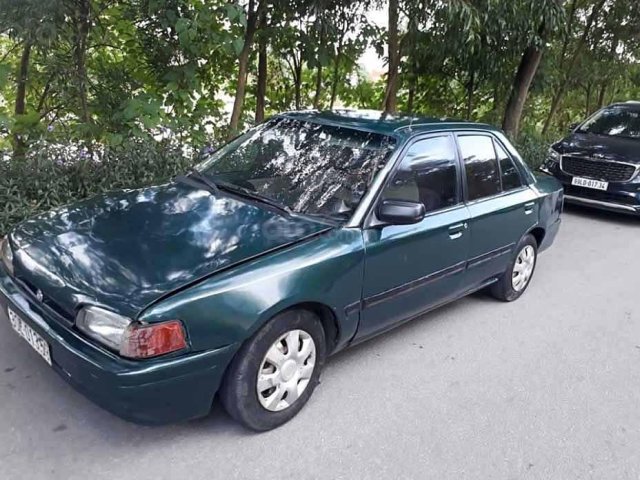 Cần bán lại xe Mazda 323 1.6 MT năm 1996, màu xanh lam, nhập khẩu nguyên chiếc  0