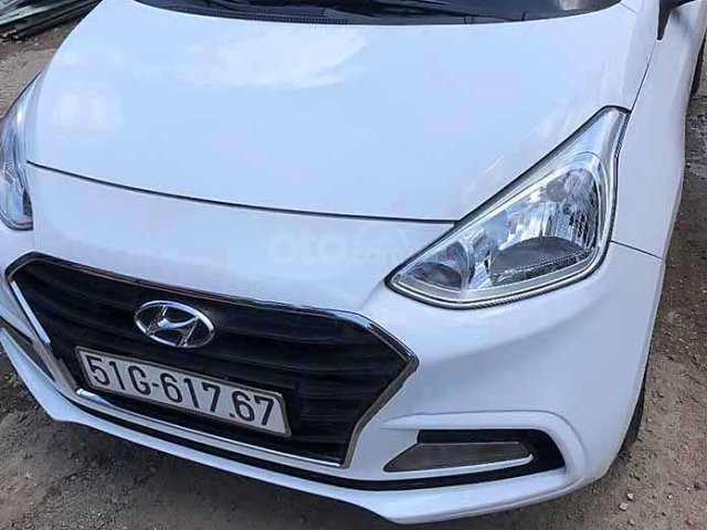 Cần bán gấp Hyundai Grand i10 1.2 MT sản xuất 2018, màu trắng còn mới 