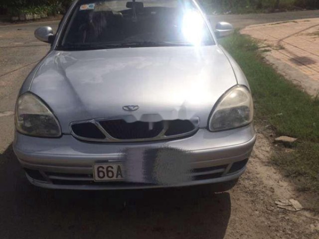 Cần bán Daewoo Nubira năm sản xuất 2004, màu bạc, xe nhập0