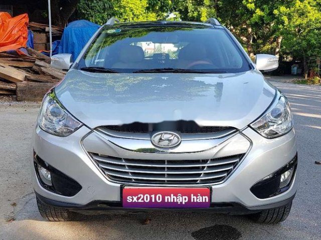 Bán lại xe Hyundai Tucson 2010, màu bạc, xe nhập số tự động, máy dầu0