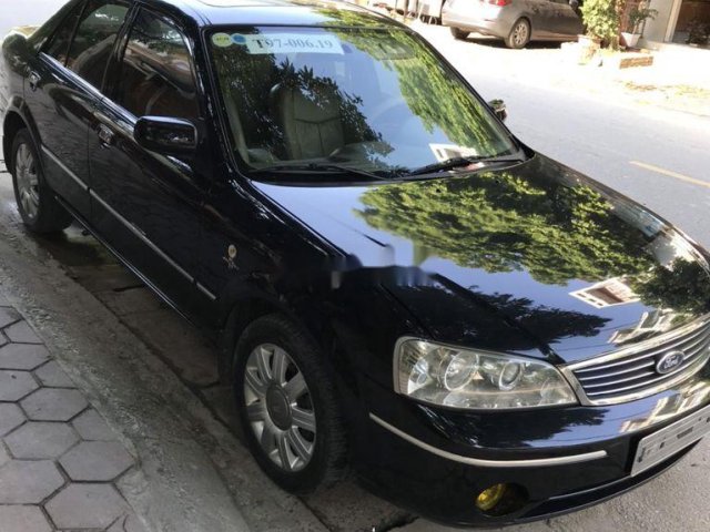 Bán ô tô Ford Laser đời 2005, màu đen còn mới, giá 170tr0