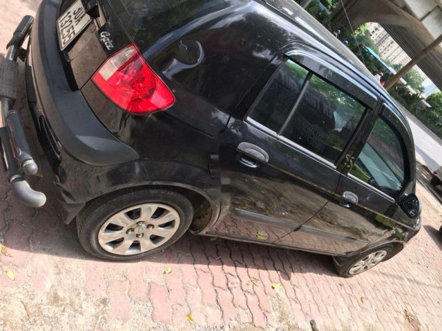 Cần bán Hyundai Getz 1.4 AT đời 2010, màu đen, xe nhập như mới