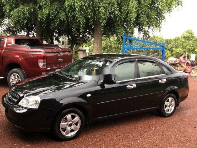 Cần bán Daewoo Lacetti đời 2009, màu đen0