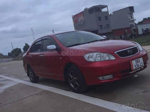 Cần bán xe Toyota Corolla Altis 1.8G AT đời 2003, màu đỏ, xe nhập chính chủ0