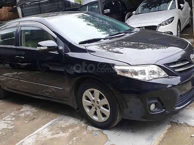 Cần bán lại xe Toyota Corolla Altis 1.8 G đời 2012, màu đen còn mới 