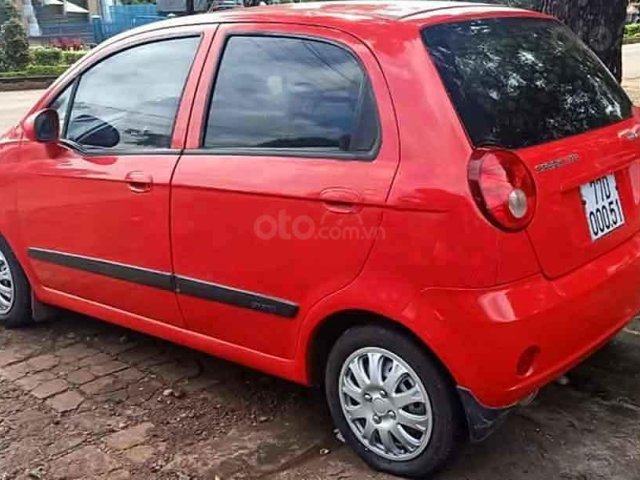 Bán xe Chevrolet Spark Lite 2013, màu đỏ còn mới