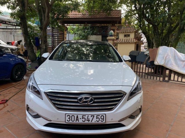 Cần bán gấp Hyundai Sonata đời 2015, màu trắng chính chủ, 660tr