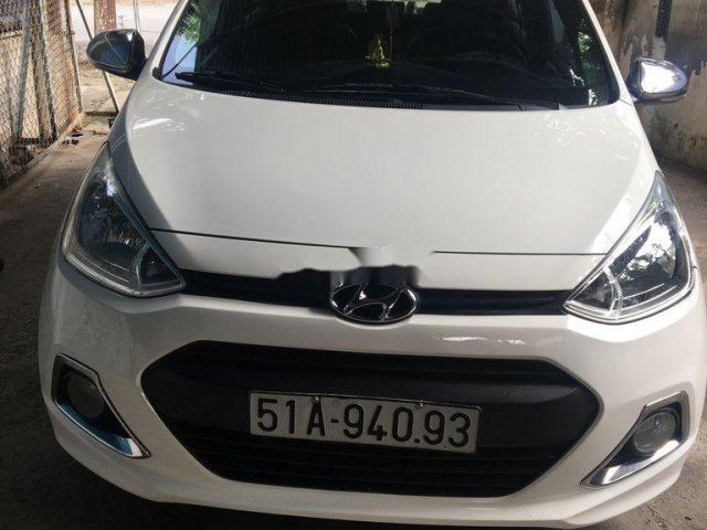 Cần bán xe Hyundai Grand i10 năm sản xuất 2014, màu trắng, xe nhập xe gia đình