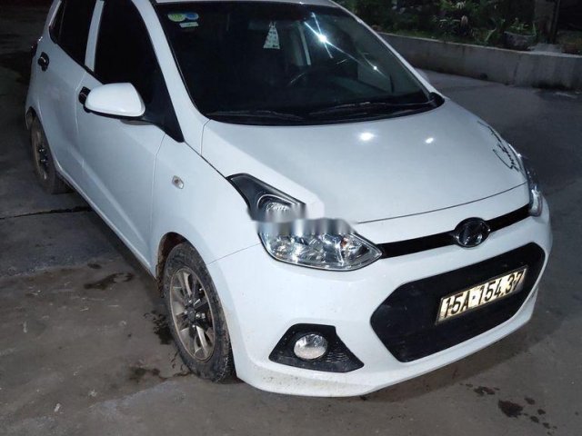 Chính chủ bán Hyundai Grand i10 năm 2014, màu trắng số sàn0