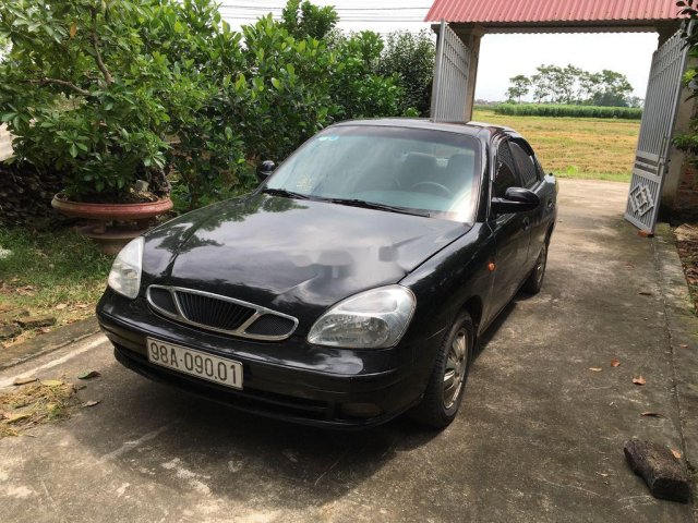 Cần bán lại xe Daewoo Nubira 2003, màu đen