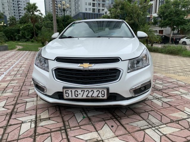 Cần bán Chevrolet Cruze đời 2015, màu trắng, số sàn0