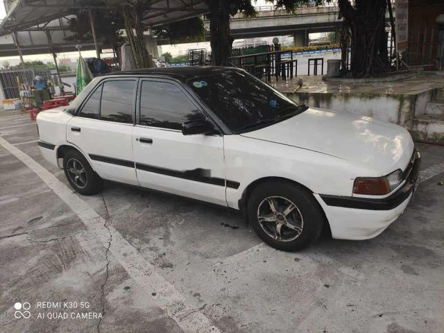 Bán Mazda 323 sản xuất năm 1995, màu trắng, nhập khẩu, giá chỉ 27 triệu