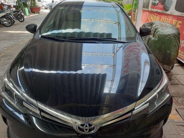 Cần bán lại xe Toyota Corolla Altis 1.8G sản xuất năm 2019, màu đen như mới0