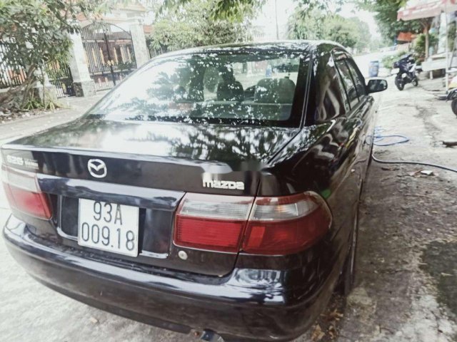 Bán ô tô Mazda 626 đời 1999, màu đen, giá chỉ 125 triệu