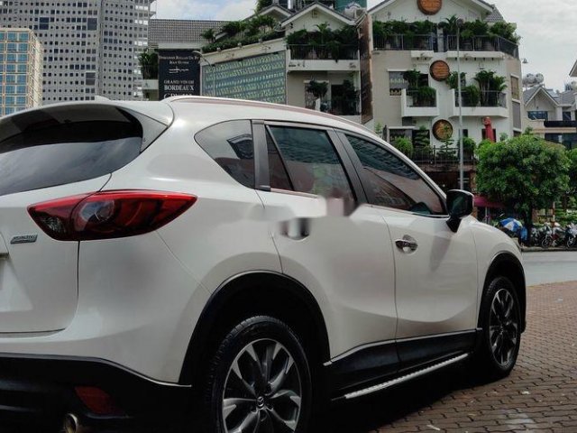 Cần bán xe Mazda CX 5 đời 2017, màu trắng, xe chính chủ0