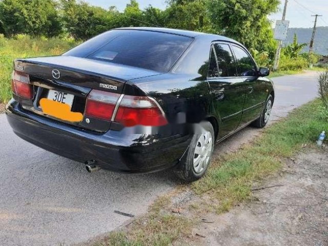 Bán Mazda 626 đời 1999, màu đen0