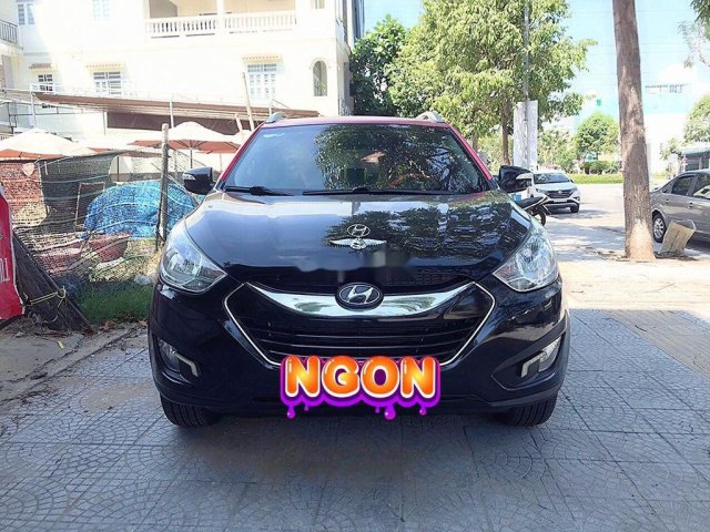 Cần bán xe Hyundai Tucson đời 2013, màu đen, nhập khẩu nguyên chiếc, xe gia đình