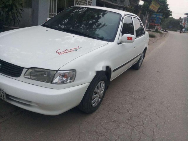 Bán ô tô Toyota Corolla năm 2001, màu trắng, nhập khẩu 