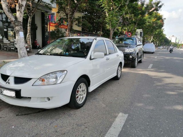 Cần bán lại xe Mitsubishi Lancer đời 2003, màu trắng, nhập khẩu nguyên chiếc 0