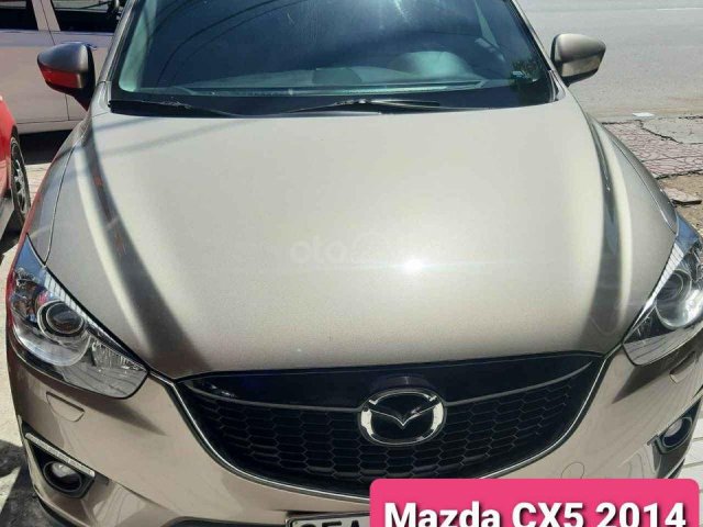 Cần bán xe Mazda CX5 sản xuất 2014, màu vàng cát, 1 chủ sử dụng