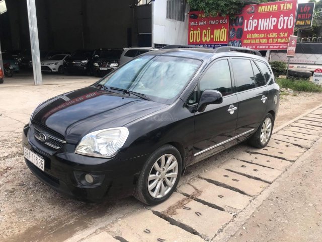 Bán xe Kia Carens 2010, số sàn, màu đen0