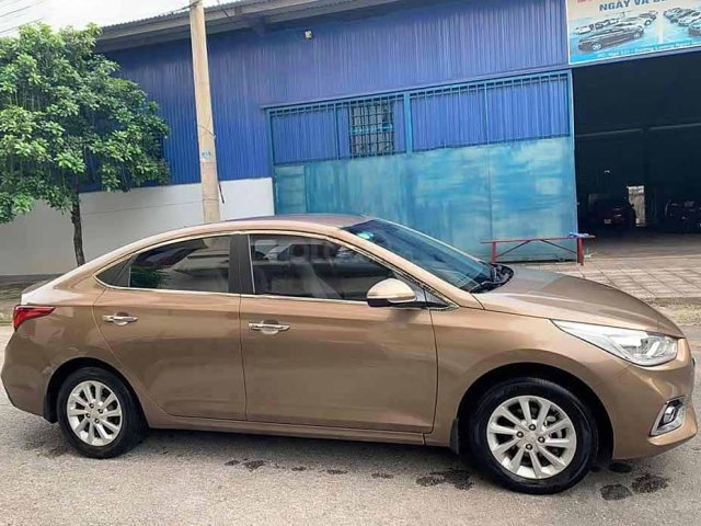 Cần bán xe Hyundai Accent 1.4 MT Base năm 2018, màu nâu 0