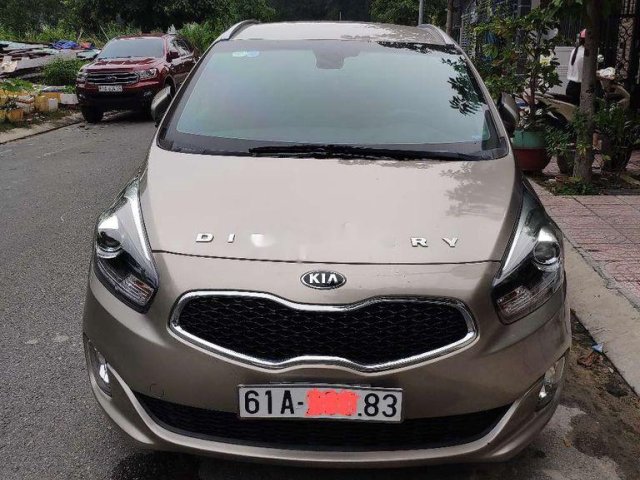 Bán Kia Rondo đời 2016, màu ghi vàng0