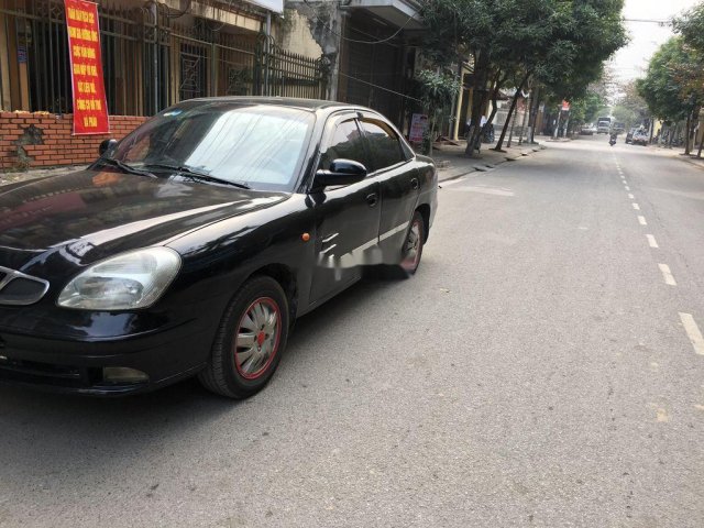 Cần bán gấp Daewoo Nubira đời 2002, màu đen, nhập khẩu nguyên chiếc còn mới, 75 triệu0