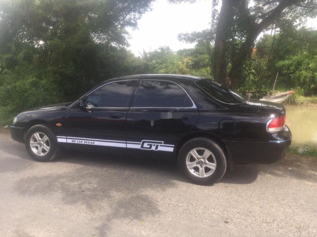 Cần bán Mazda 626 đời 1997, màu đen, xe nhập, giá chỉ 128 triệu0