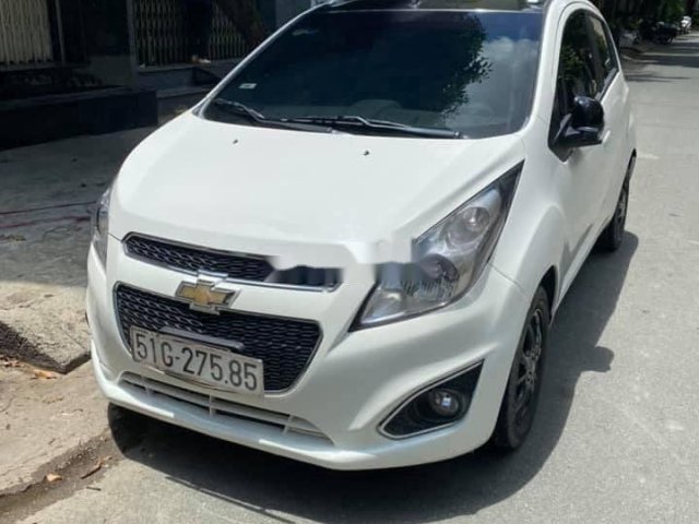 Cần bán lại xe Chevrolet Spark 1.2 LT đời 2016, màu trắng