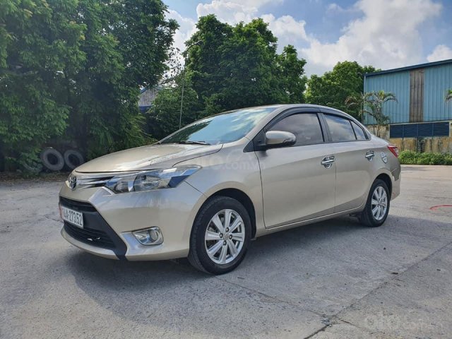 Bán xe Toyota Vios E sx 2016 màu vàng cát