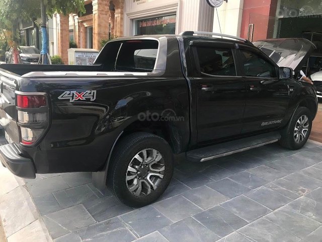 Cần bán lại xe Ford Ranger 3.2 Wildtrak đời 2016, màu đen, nhập khẩu nguyên chiếc còn mới0