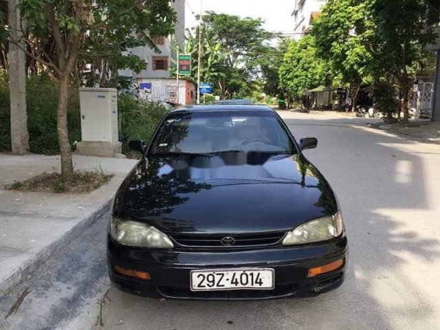 Cần bán gấp Toyota Camry LE năm 1997, màu đen, nhập khẩu0