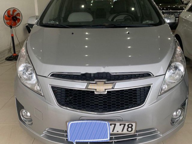 Cần bán Chevrolet Spark năm sản xuất 2012, màu bạc0