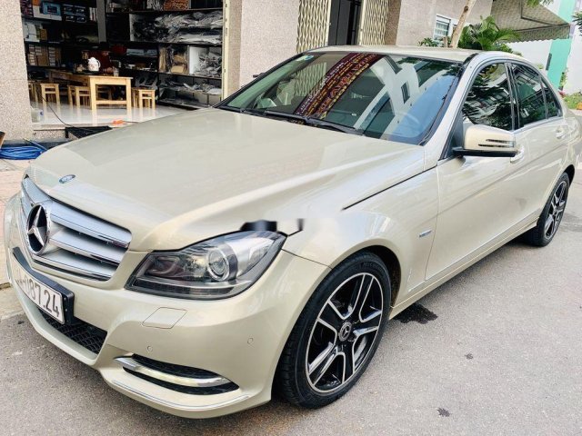 Cần bán lại xe Mercedes C200 2012, màu vàng, giá tốt0