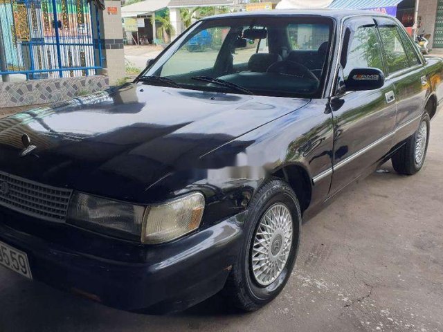 Cần bán gấp Toyota Cressida đời 1990, màu đen còn mới0