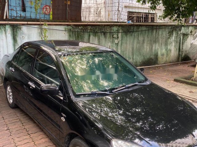 Bán ô tô Mitsubishi Lancer đời 2005, ít sử dụng, màu đen0